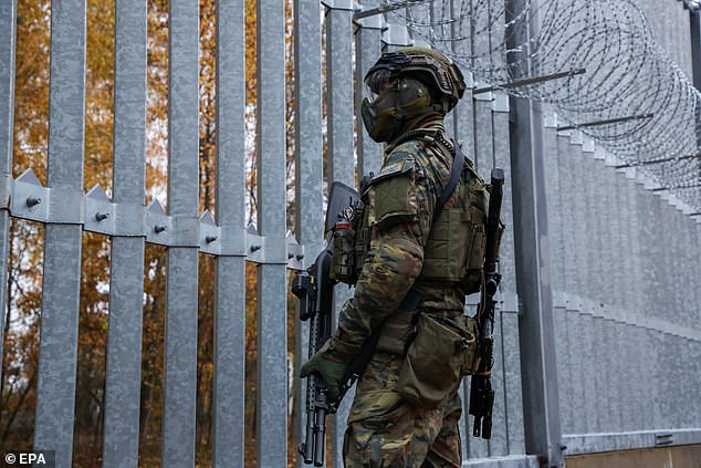 A border guard patrols at the Polowce-Pieszczatka border crossing in 2024