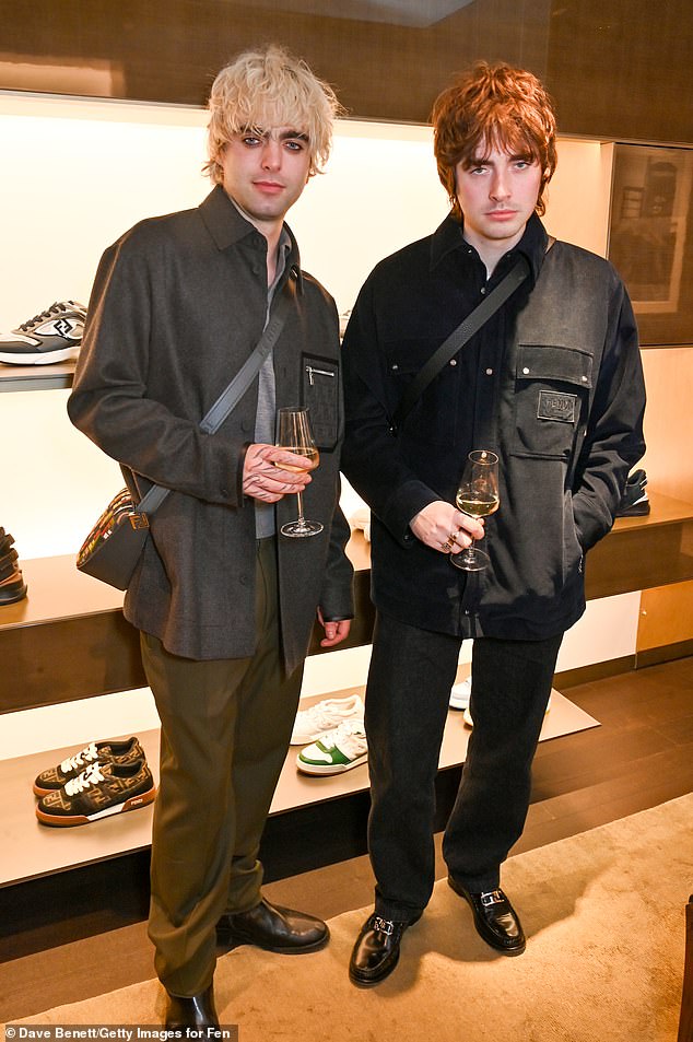 They were joined at the launch by their brother Gene, 23, who coordinated his look with Lennon's.