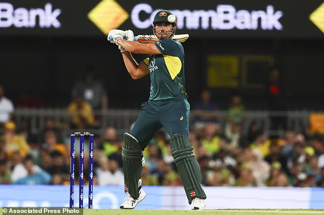 Marcus Stoinis bats during the T20 international cricket match between Pakistan and Australia at the Gabba in Brisbane, Australia, Thursday, Nov. 14, 2024. (AP Photo/Tertius Pickard)