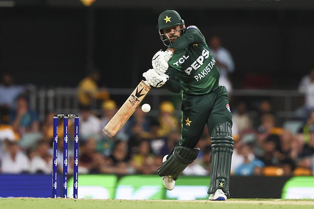 Pakistan's Usman Khan bats during the T20 international cricket match between Pakistan and Australia at the Gabba in Brisbane, Australia, Thursday, Nov. 14, 2024. (AP Photo/Tertius Pickard)