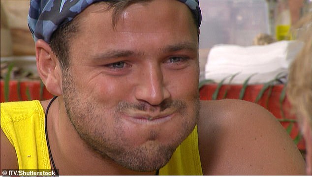 Mark Wright photographed struggling through a bushtucker test during his time in the jungle in 2011.