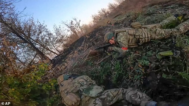 In this image taken from a video released by the Russian Ministry of Defense on Thursday, November 7, 2024, Russian army soldiers fight with Ukrainian armed forces in the Sudzhansky district of the Kursk region of Russia.