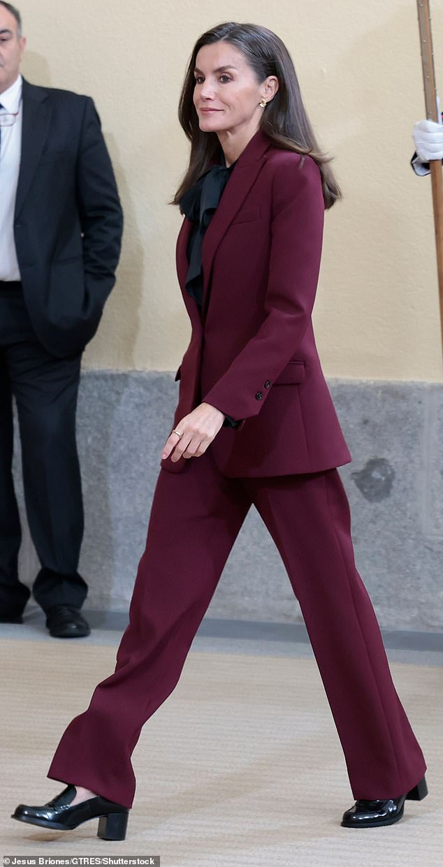 Letizia looked in high spirits as she stepped out yesterday with a warm smile on her face in a stunning ensemble.