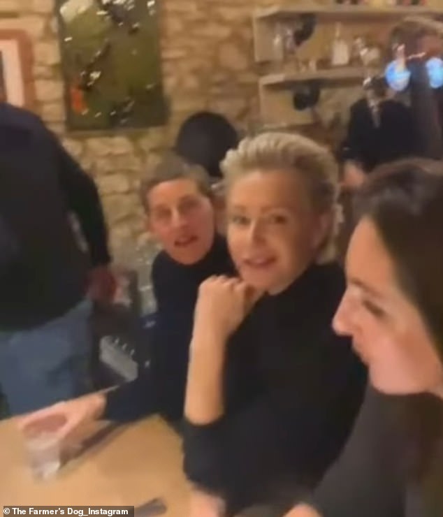 Ellen (left) was seen enjoying music at the Oxfordshire pub while Jeremy's partner Lisa filmed the room.