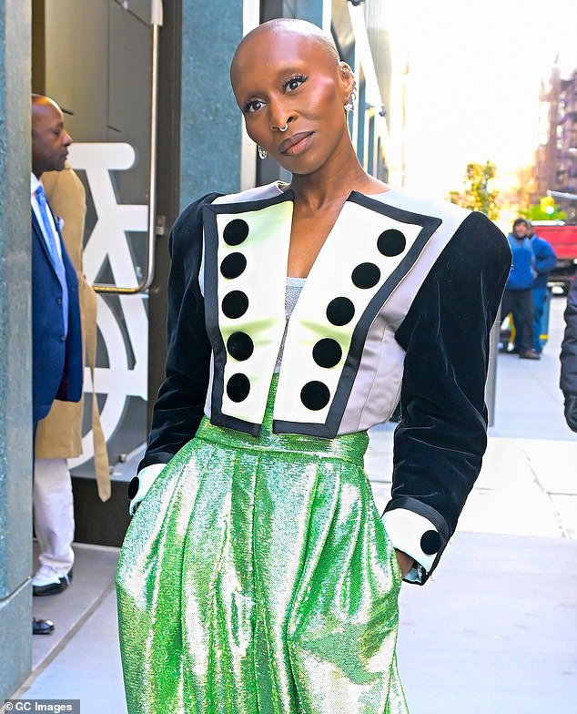 The 37-year-old British actress, who plays Elphaba alongside Ariana Grande's Glinda in the highly anticipated musical film, turned heads in a top paired with neon green pants while heading to an ABC studio.