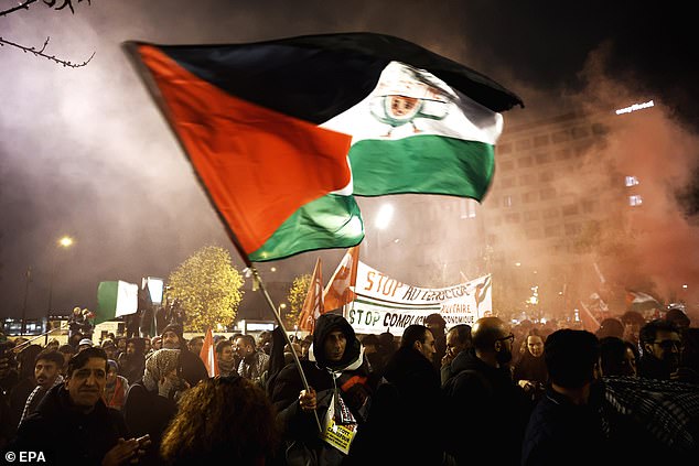 Pro-Palestinian demonstrators marched outside the venue before the match