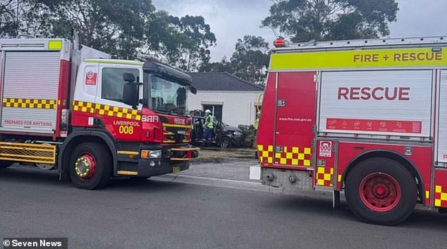 Emergency services (pictured) were called to the scene after two women were momentarily trapped inside the vehicle. Both were taken to Liverpool Hospital with minor injuries.