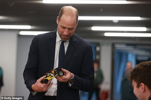 He seemed particularly interested in a small remote-controlled car built by a mechanical engineering student, and picked it up to admire.