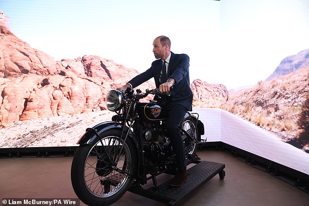 The future King clearly had fun posing on a model motorcycle and playing with the cameras.