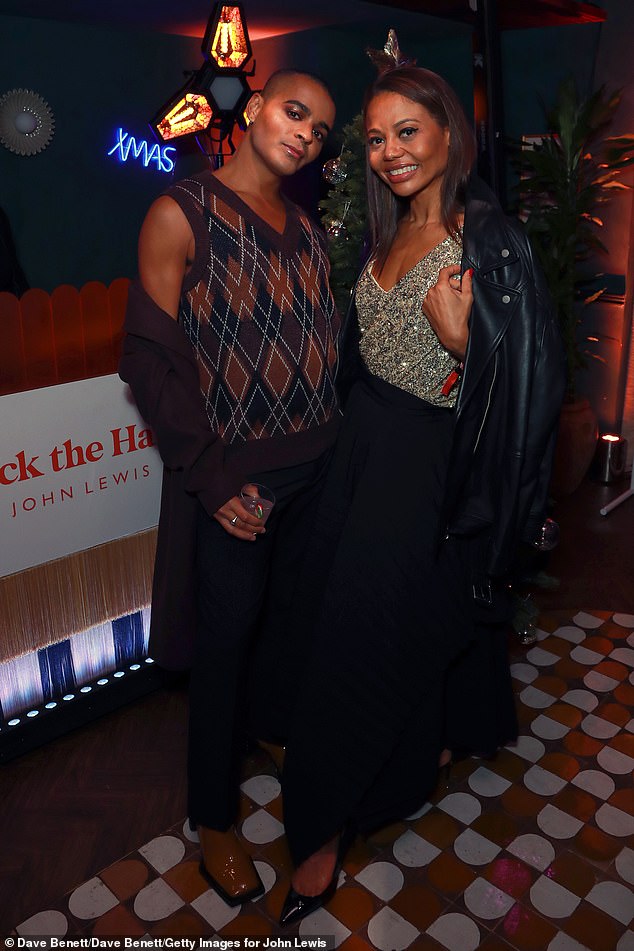 Emma happily posed for photos with actor Layton Williams, who transformed cozy winter knitwear into a chic evening outfit.