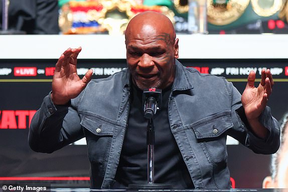 IRVING, TEXAS – NOVEMBER 13: Mike Tyson speaks at the final press conference for his upcoming heavyweight fight against Jake Paul at Toyota Music Factory on November 13, 2024 in Irving, Texas. (Photo by Ed Mulholland/Getty Images)