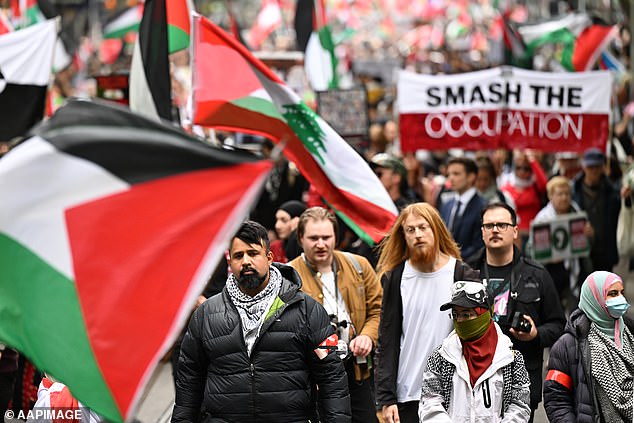 Protesters march during a pro-Palestine demonstration in Melbourne in October.