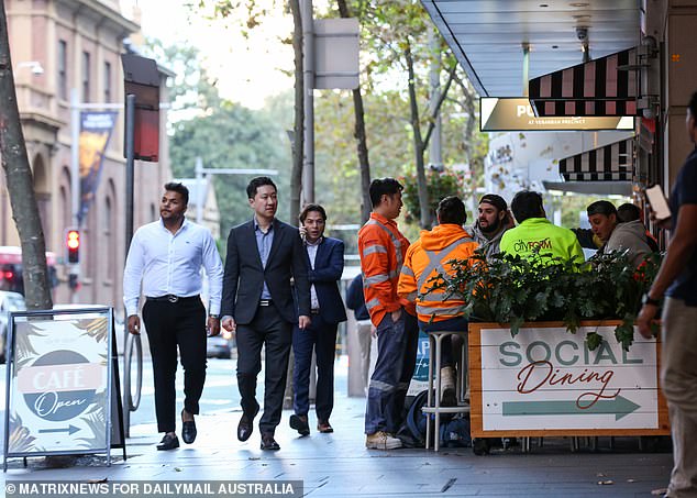 Australian workers could soon receive two months of long service leave even if they don't stay with the same employer for 10 years under a radical new plan (pictured, workers in Sydney)