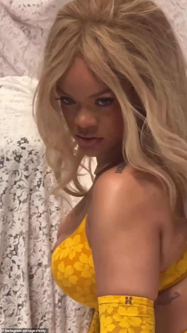 1731654866 430 Rihanna puts on VERY cheeky display in yellow lace lingerie