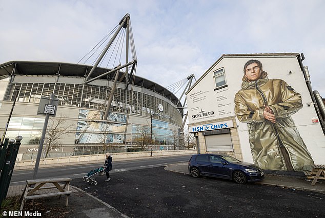 However, people have compared the singer to a 'roast chicken' in the mural which is part of a partnership with clothing brand Stone Island.