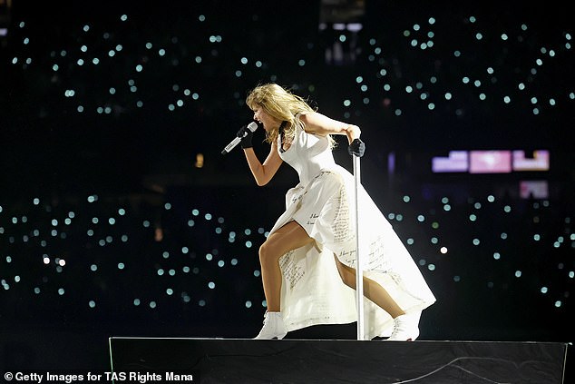 Elsewhere in the show, she also donned a strapless white dress with an asymmetrical hem and matching ankle boots.