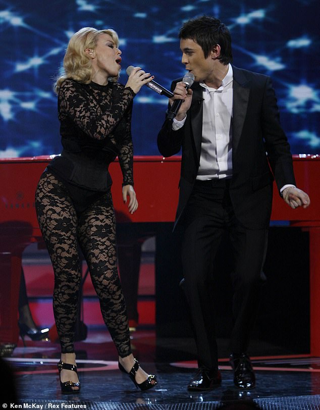 The singer was mentored by Dannii Minogue during the fourth series of the competition and beat Rhydian Roberts for the title (pictured during the final with Kylie Minogue).