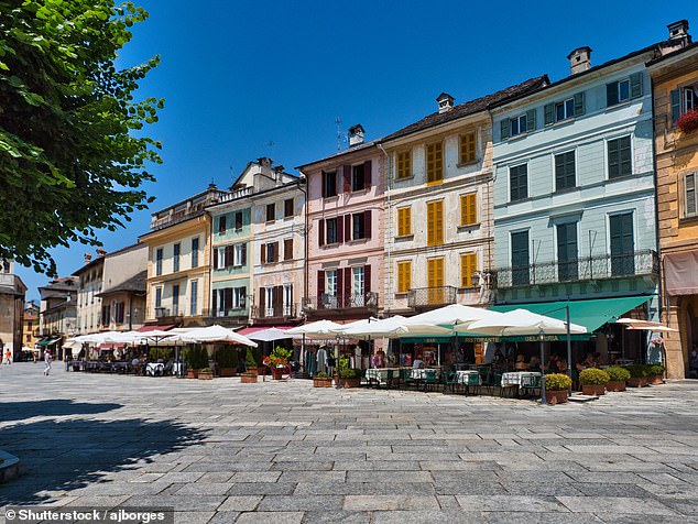 In the town of Orta San Giulio, Kate explores Piazza Motta (seen here), with its 