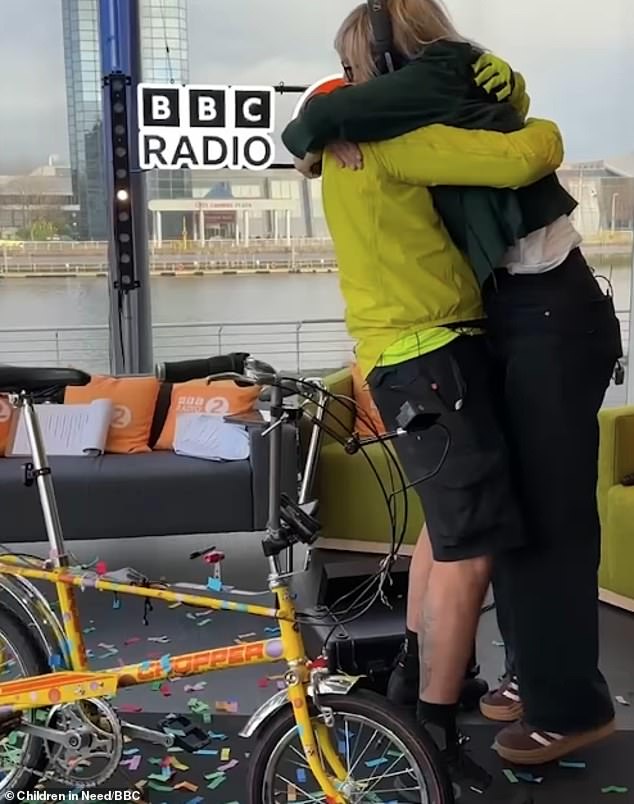 The TV personality arrived in Glasgow at 10.30am after leaving Wrexham on Monday in a small rally helicopter and was greeted by a large crowd and a hug from Zoe Ball.