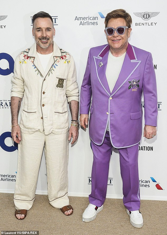 Sir Elton recently revealed he had quit sugar to control his blood sugar levels after struggling with health problems (pictured with David in 2019)