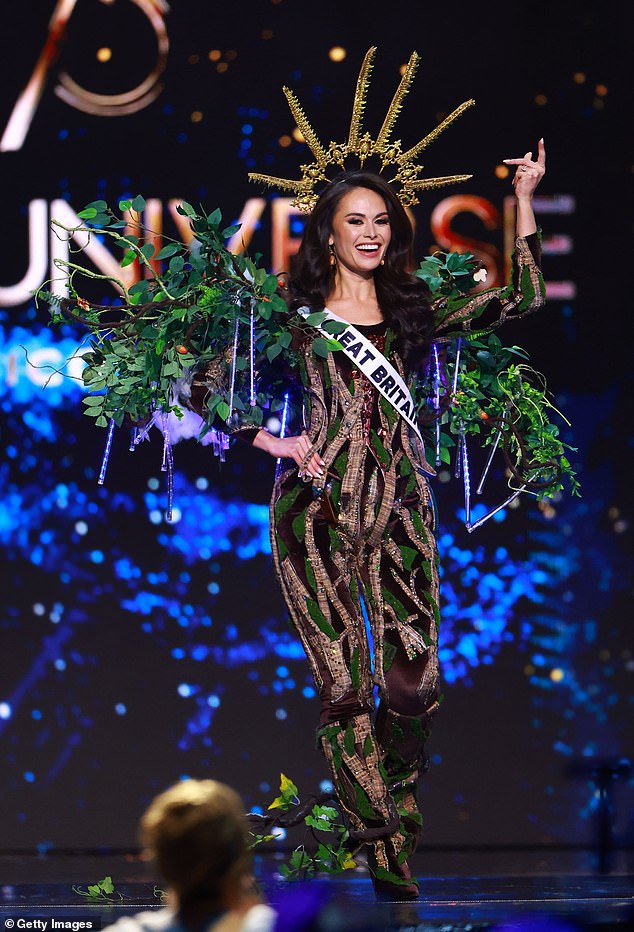 Miss Great Britain dressed in a leaf-adorned jumpsuit and a huge golden crown to represent the UK's 121 million oak trees.