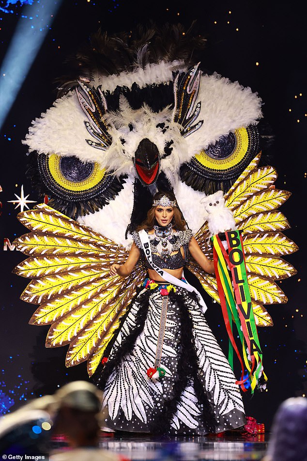 Miss Bolivia, Juliana Barrientos, wore a spectacular skirt and owl-shaped headdress