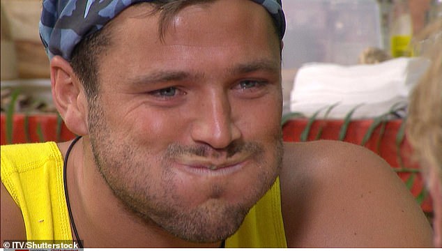 Mark Wright photographed struggling through a bushtucker test during his time in the jungle in 2011.