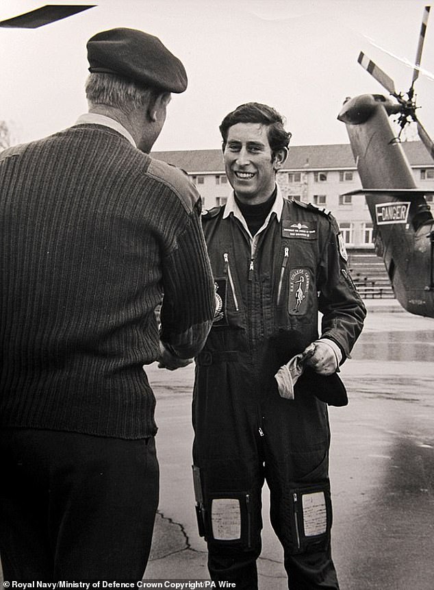 King Charles III, then Prince of Wales, in his flight suit, landed his Wessex V helicopter on the parade ground of the Royal Marines Commando Training Centre.