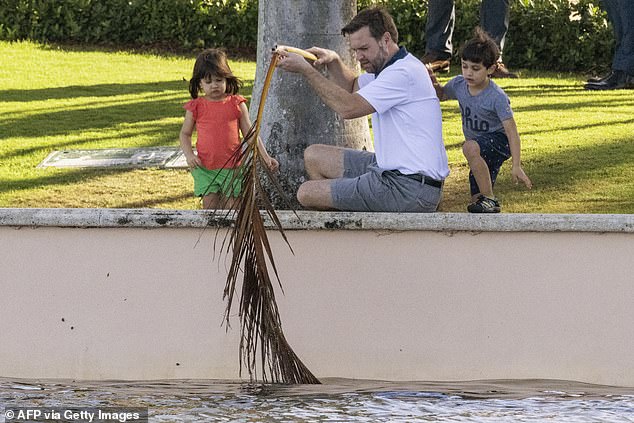 Dad shows them how to do it on Friday morning