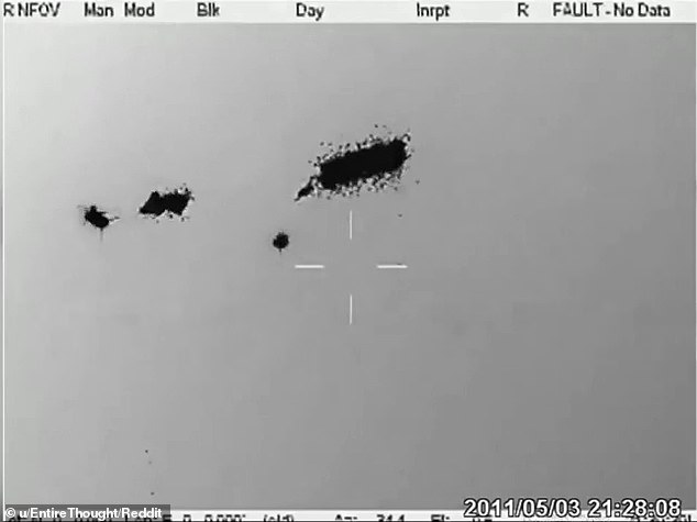 The video showed some type of artillery or missile striking two of the levitating orbs before the debris quickly dissipated into the air, leaving the mysterious orbs in their original state.