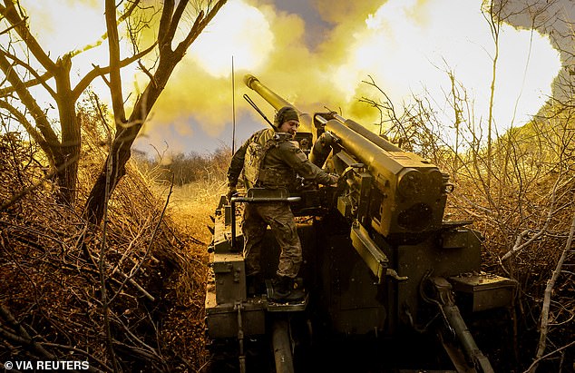 A serviceman of the 24th mechanized brigade named after King Danylo of the Armed Forces of Ukraine fires a self-propelled howitzer 'Hyacinth-s' 2s5 towards Russian troops on the front line near the town of Chasiv Yar in Donetsk region, Ukraine, on November 18, 2024.