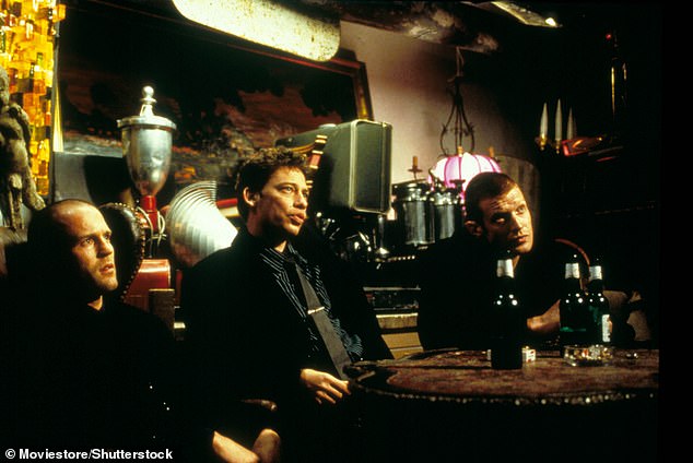 The designer began working in theater companies before transitioning to the screen, working on Guy Ritchie's Lock, Stock and Two Smoking Barrels (pictured by Jason Statham, Dexter Fletcher and Jason Flemyng in the film).