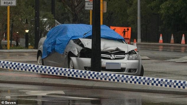 A man was arrested and two children were left in the back seat of a crashed sedan