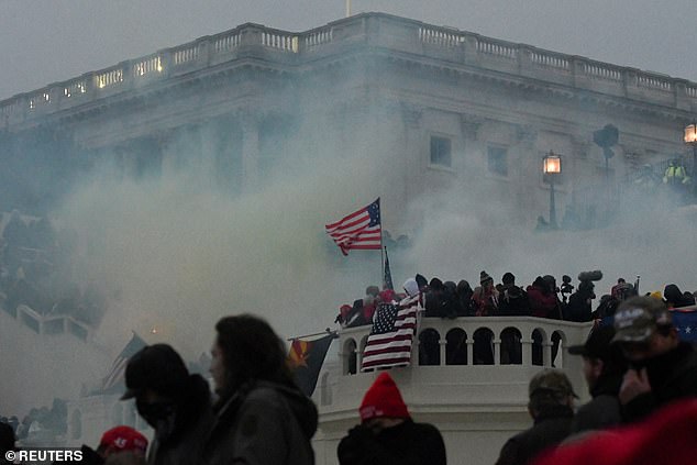 Police clear the US Capitol building with tear gas as supporters of US President Donald Trump gather outside in Washington, US, on January 6, 2021.