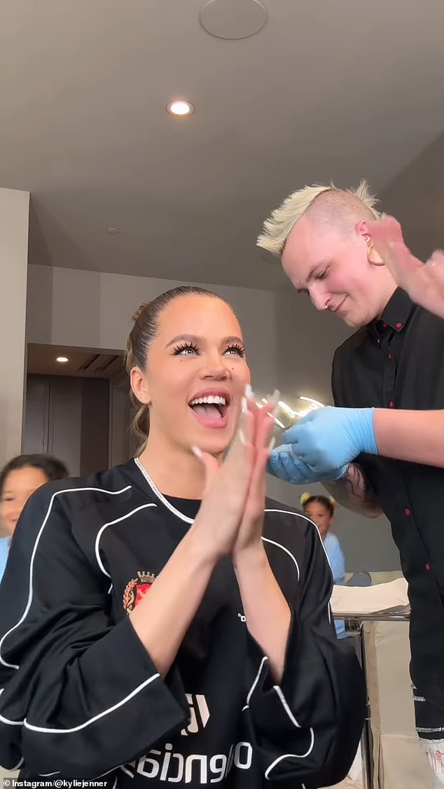 The piercer quickly does it for her and Khloe is surprised that it didn't hurt at all.