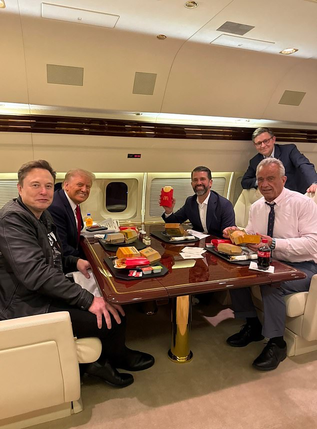 He's shown above taking a break from Make America Healthy Again while eating some McDonald's on Trump's plane.