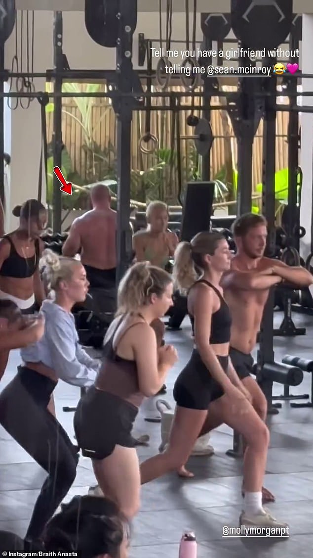 The former rugby league player then panned around the room to show Sean blissfully unaware of the women as they did a group workout.