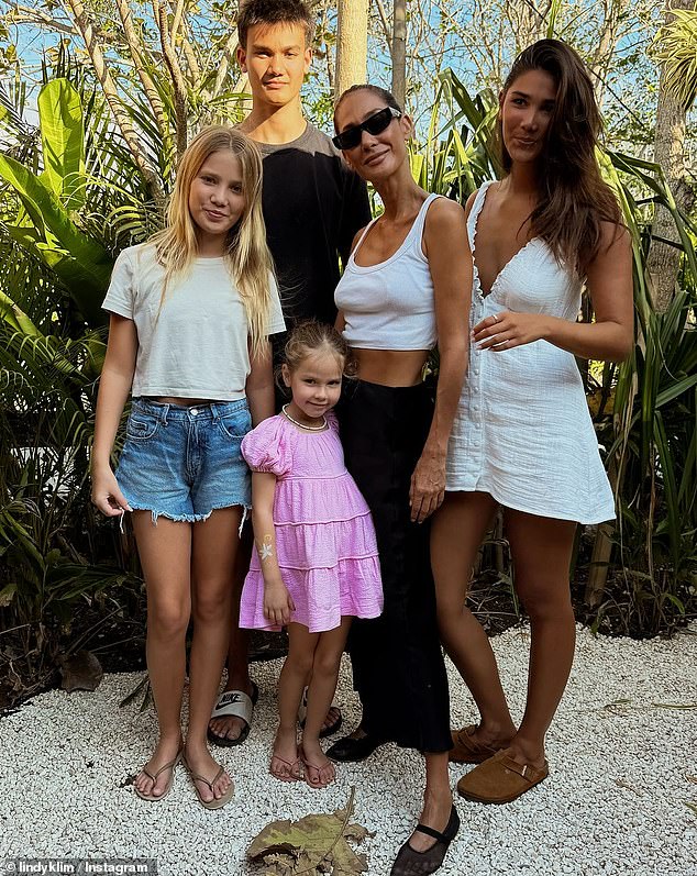 Speculation arose in October about the end of his second six-year marriage. The mother of four posed for a family portrait with her children, with no sign of Ellis.