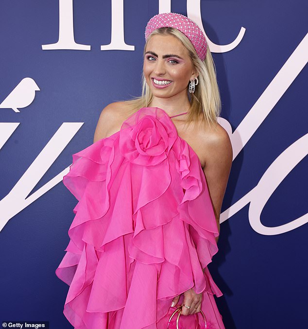 Leary (pictured at this year's Melbourne Cup) said she was 21 when she attempted to take her own life but was interrupted by a stranger.