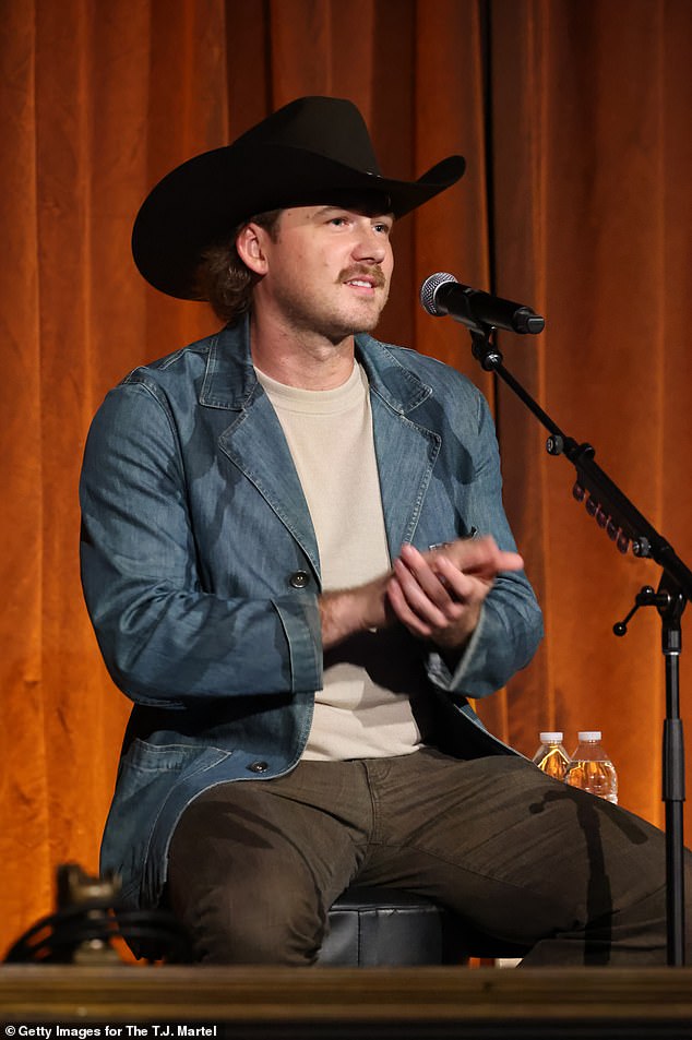 It was also revealed in the video that she was involved with country superstar Morgan Wallen, 31, who 'hurt her feelings' but 'she kept coming back'; Wallen photographed in September