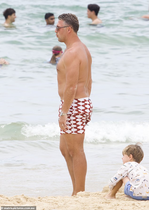 Sam was wearing a pair of red and white striped shorts that ended at Sam's taut thighs.