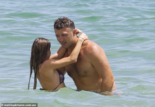 After a burst of activity, Lucy and Sam decided to cool off in the crystal clear water and take some time to themselves while they looked after Robbie on the shore.