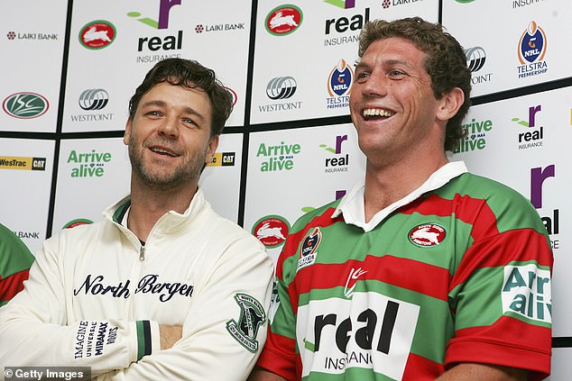 Fletcher said he once walked through a wall with Hollywood star and Souths owner Russell Crowe (pictured together) during a football session in a pub.