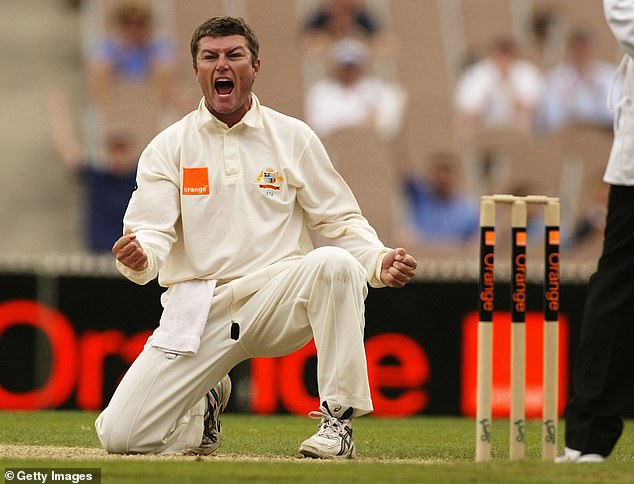 The former bowler is shown taking a wicket in the Ashes series against England in 2002.