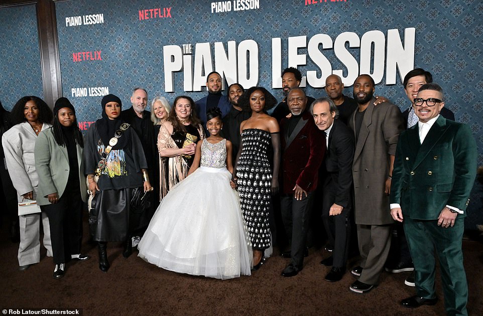 The cast gathered for a group shot.