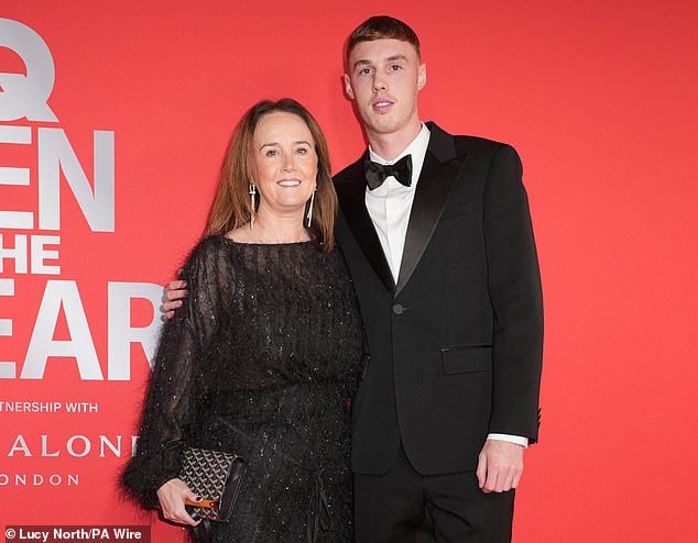 Palmer also posed for a photo with her mother Marie (left) at the stylish event in London.