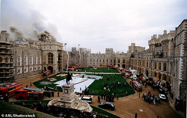 Firefighters and soldiers gather at Windsor Castle to fight the fire.