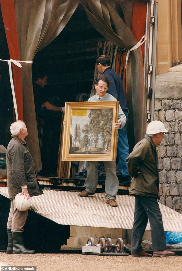 A beautiful painting rescued from the fire... a team of restorers was working on the Windsor artwork when one of them noticed a burning smell