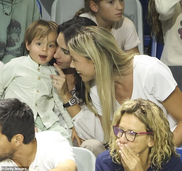 The boy seemed happy to cheer up his father; The youngster has become a regular at Nadal's matches close to home in recent months.