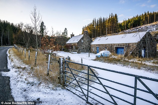 Pictured, snow and ice in Corgaff, Aberdeenshire today, as the UK prepares for more snow to fall.